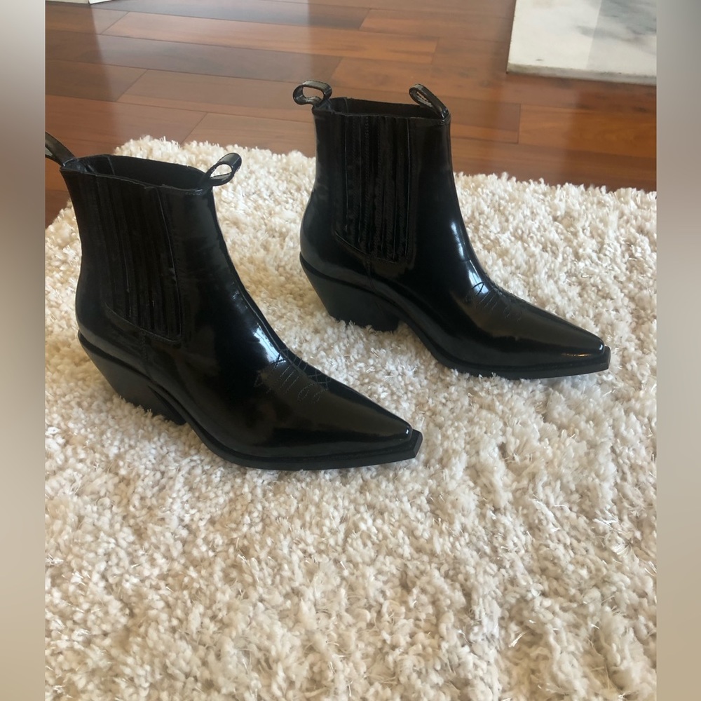 Anine Bing patent leather western boots.